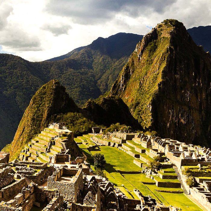 Tourist looking at Machu Picchu --- Image by © Picturegarden/Corbis